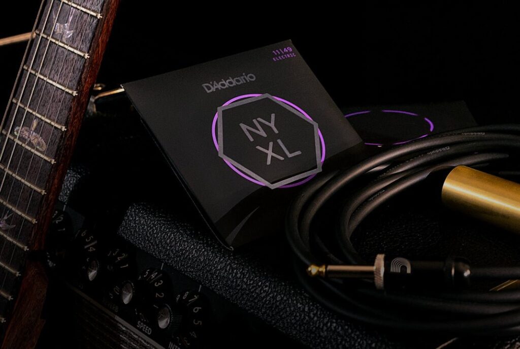 D'Addario NYXL electric guitar strings on a guitar amp
